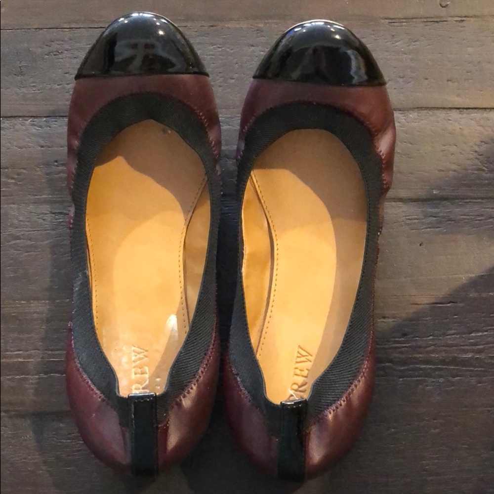 Burgundy flats with black trim